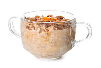 Pot of tasty oatmeal with pumpkin on white background