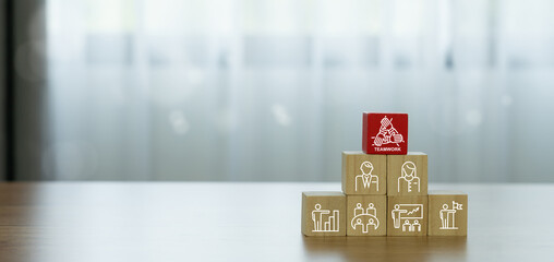 Unity and teamwork icon concept on wood box .cooperation success business.Hand united together. Mission, Trust, support, Cooperation, Brainstorming, Planning, Discussion, collaboration, communication,