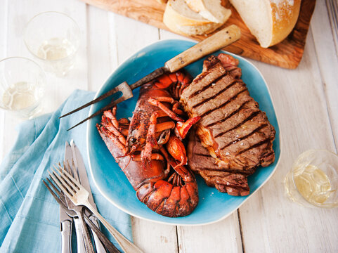 Surf and Turf Platter with Lobster and Steak; Bread in the Background