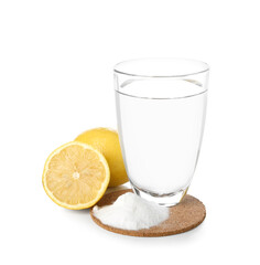 Glass of water, baking soda and  lemon on white background