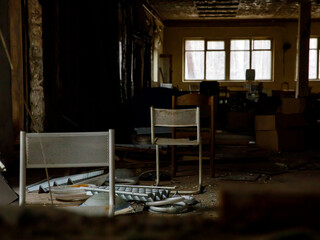Interior of ruined, abandoned administrative, residential building. The ruins of an abandoned...