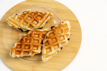Croffles. Croissant dough is molded using a waffle mold. Flat lay
