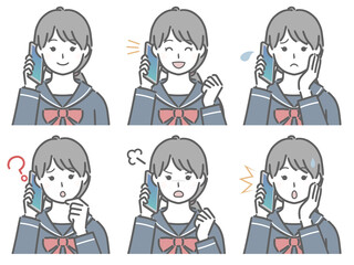 スマホで話す女子学生