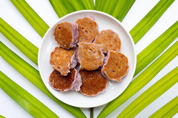 Coconut pancake on white background.