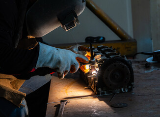 Engineer workers use arc welding machines. Cutting of rebar and rebar at the construction site...