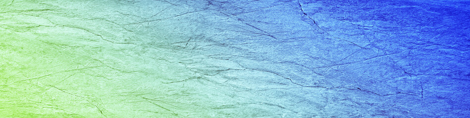 Beautiful blue green texture. Gradient. Toned cracked rough stone surface. Abstract colorful background with space for design. Backdrop, wallpaper. Web banner. Website header. Panoramic.