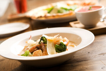 pasta in a creamy sauce with seafood