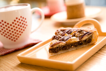 A slice of delicious home made pecan pie