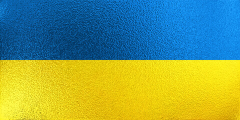 Template or wallpaper for ukrainian concept. Metallic shiny surface. Colors of the national ukrainian flag. Yellow and blue background with copy space for your text. 