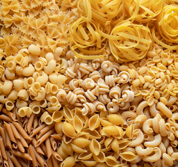many types of raw pasta top view square crop, italian pasta background