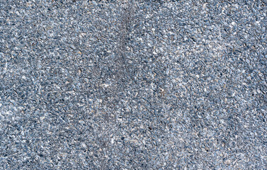 The surface of the old roof is covered with rubiroid close-up. construction concept. Texture