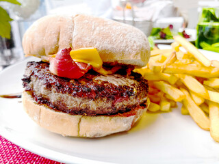 Cheeseburger - American cheese burger with Golden French fries