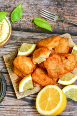   Allasca Pollock Fish  Bites in a crispy Tempura  Batter.Fish and chips .Close up of   crispy...