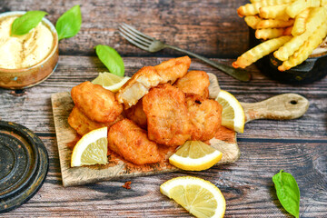   Allasca Pollock Fish  Bites in a crispy Tempura  Batter.Fish and chips .Close up of   crispy...