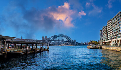 Sydney Harbour Australia with nice colours in the sky. Nice blue water of the Harbour, high rise offices and residential buildings of the City in the background, NSW Australia