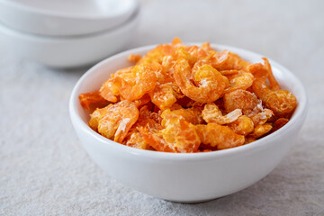 Dried shrimp in white bowl.