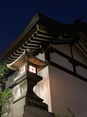 Fototapeta na wymiar Shrine at night, from the street of Ueno, Tokyo, “Hanazono shrine” year 2022, spring
