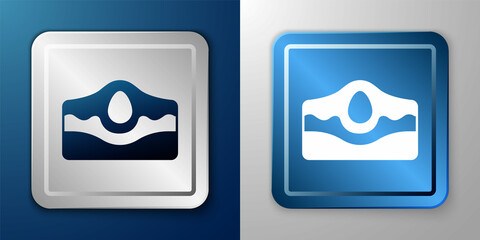 White Acne icon isolated on blue and grey background. Inflamed pimple on the skin. The sebum in the clogged pore promotes the growth of a bacteria. Silver and blue square button. Vector