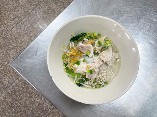 Thailand traditional noodles served with sliced pork and minced pork. A popular delicious street food of Thai peoples. Asian food. Shot from above.