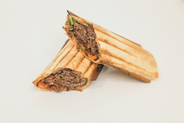 doner or shawarma in lavash on a white background
