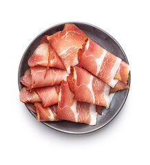 Sliced schwarzwald ham. Dried prosciutto ham isolated on white background.