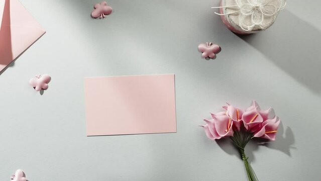 Pink background with Mother's Day card and copy space
