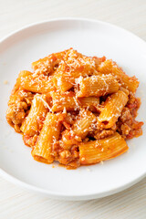 Rigatoni pasta bolognese with cheese