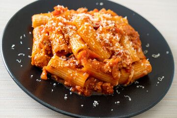 Rigatoni pasta bolognese with cheese