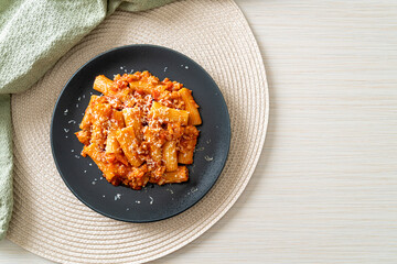Rigatoni pasta bolognese with cheese