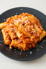 Rigatoni pasta bolognese with cheese