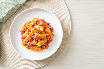 Rigatoni pasta bolognese with cheese
