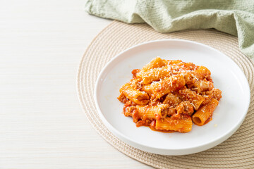 Rigatoni pasta bolognese with cheese