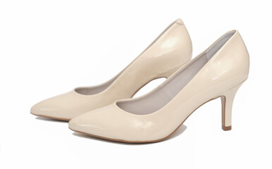 elegant leather beige shoes isolated on white background. fashion, retail or blogger content. high heel everyday comfortable shoes