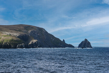 sea and coast at Cape Horn against blue sky