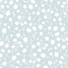 Ditsy Flower hand drawn white on blue vector seamless pattern. Liberty inspired Petite floral ditsy print. Retro 60s 70s Bloomy calico background for fashion fabric or home textile.