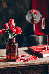 Still life with roses. Reflection. Narrow focus. Bokeh style.
