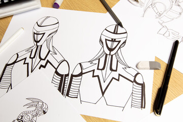 Sketches on paper of animated drawings of robots as characters for a video game. Concept art.