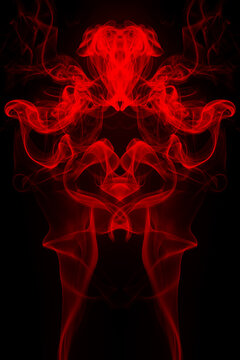 Beautiful red smoke abstract on black background, fire movement