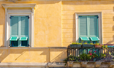 Fototapeta na wymiar Yellow House, old town of Cagliari - the capital of the Italian island of Sardinia