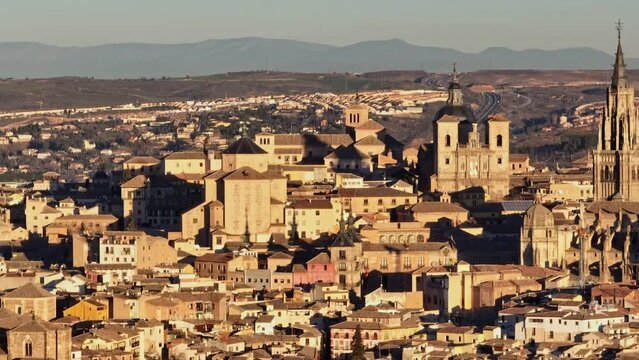 Aerial tele shot of Toledo, Spain. Morning shot of houses and cathedral in Toledo.