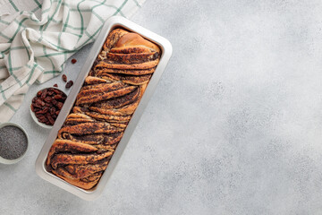 Sweet swirl homemade bread with poppy seeds