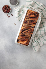 Sweet swirl homemade bread with poppy seeds