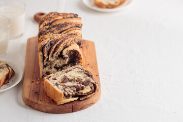 Sweet swirl homemade bread with poppy seeds