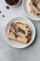 Piece of swirl homemade bread with poppy seeds