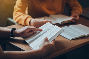 Christian Bible Study Concepts. Christian friend's groups read and study the bible together in a...