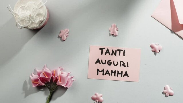 Tanti auguri Mamma for Mother's day in Italian language background