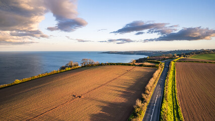 Devon Fields and Farmlands at sunset time from a drone over Shaldon and Teignmouth from Labrador...