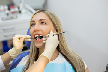 portrait of a beautiful young woman at a dentist appointment