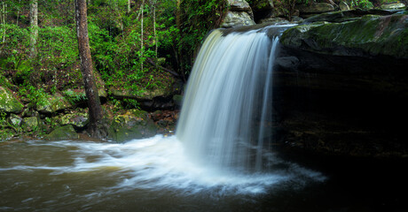 Fototapeta na wymiar Panoramic beautiful deep forest waterfall in Thailand.