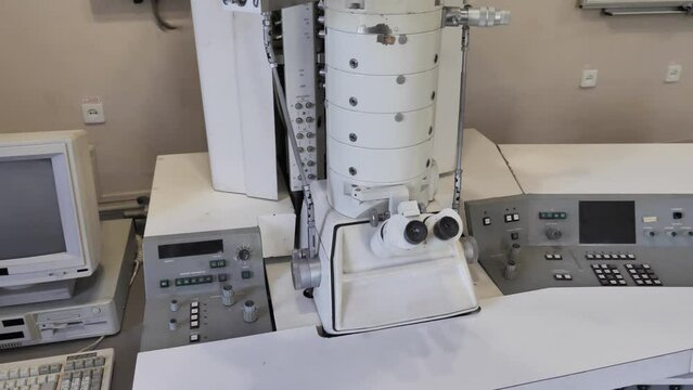 Electronic Microscope And Old Style Pc Computer In Research Laboratory
